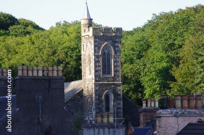 Church tower with trees in background