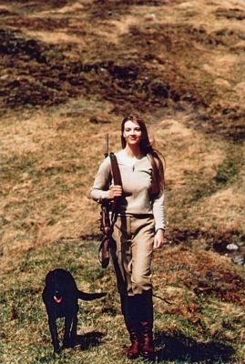 Female Gamekeeper With Dog