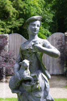 shepherdess with lamb statue